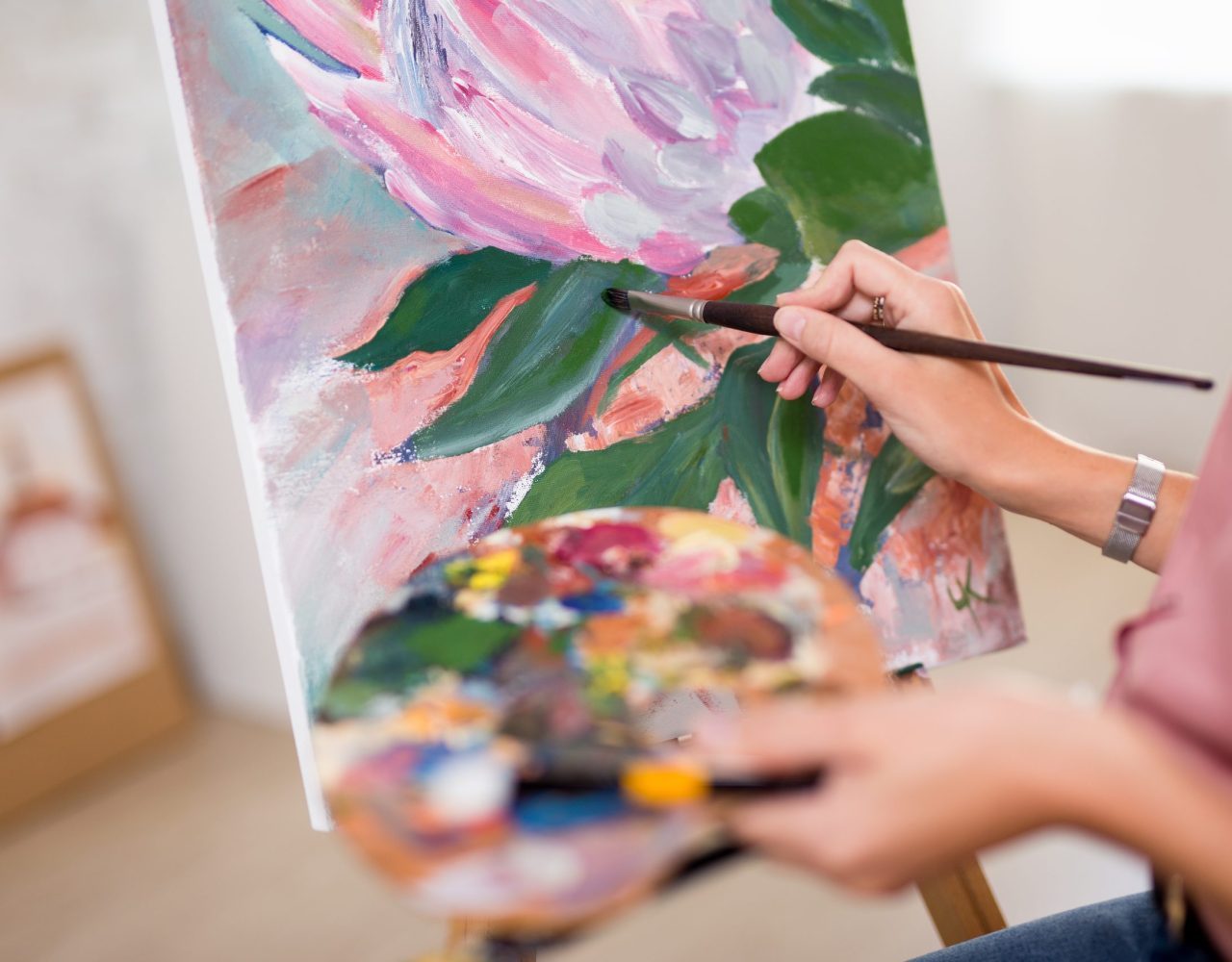 brek | Accueilart, creativity and inspiration concept – female hands with paintbrush painting at home or studio